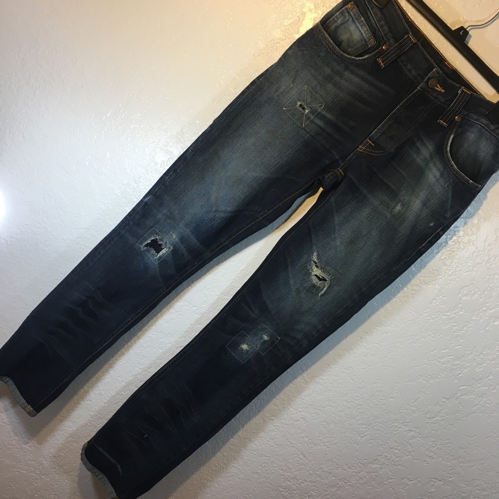 NUDIE JEANS "Grim Tim" Destructed Skinnies